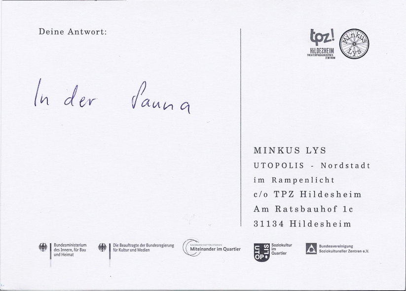 Rückseite einer Postkarte. Darauf steht: "In der Sauna"
