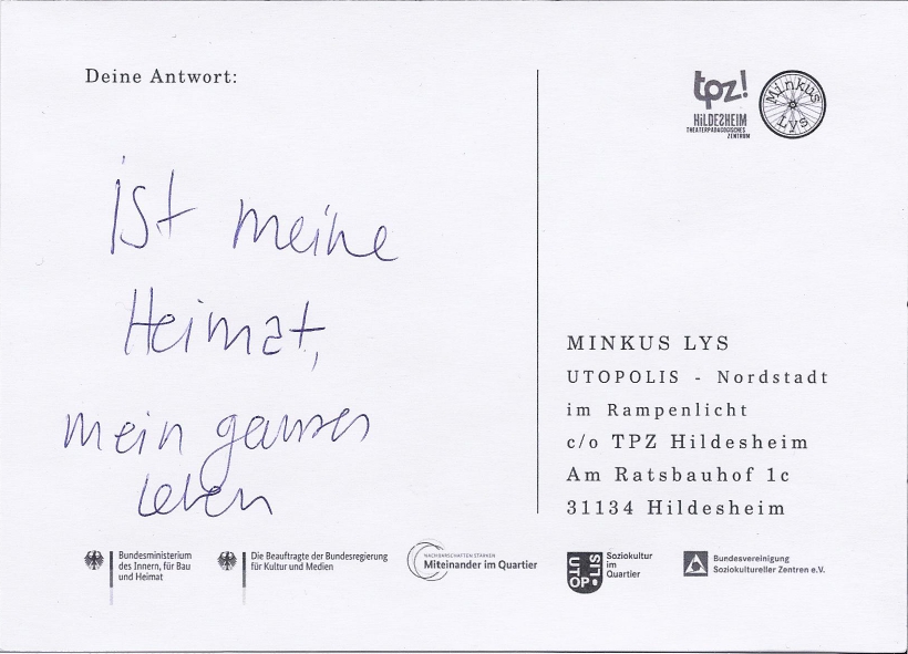 Die Rückseite einer Postkarte. Auf der Karte steht: "ist meine Heimat, mein ganzes Leben".